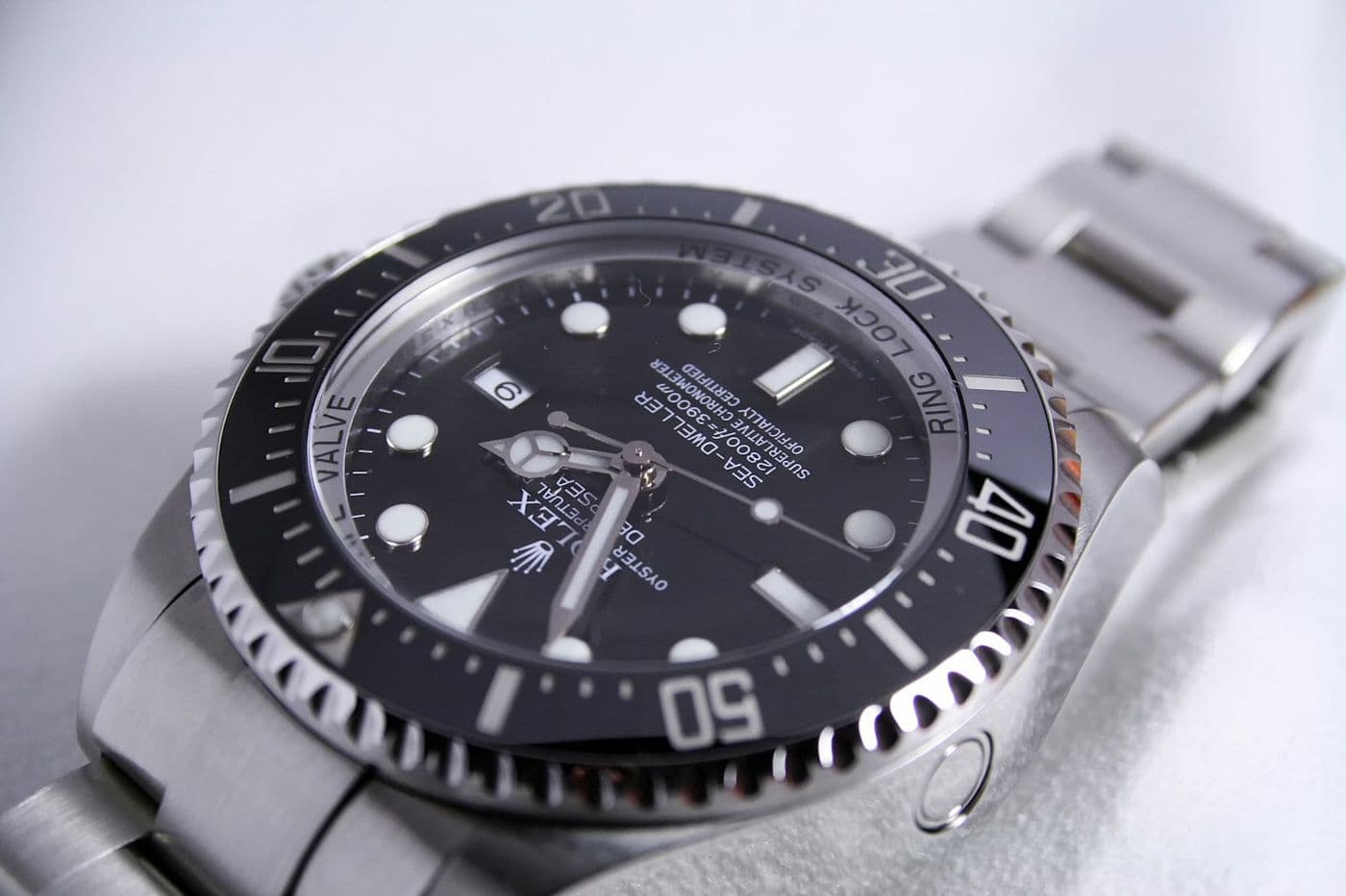 Macro photograph of a Rolex Submariner bezel and dial