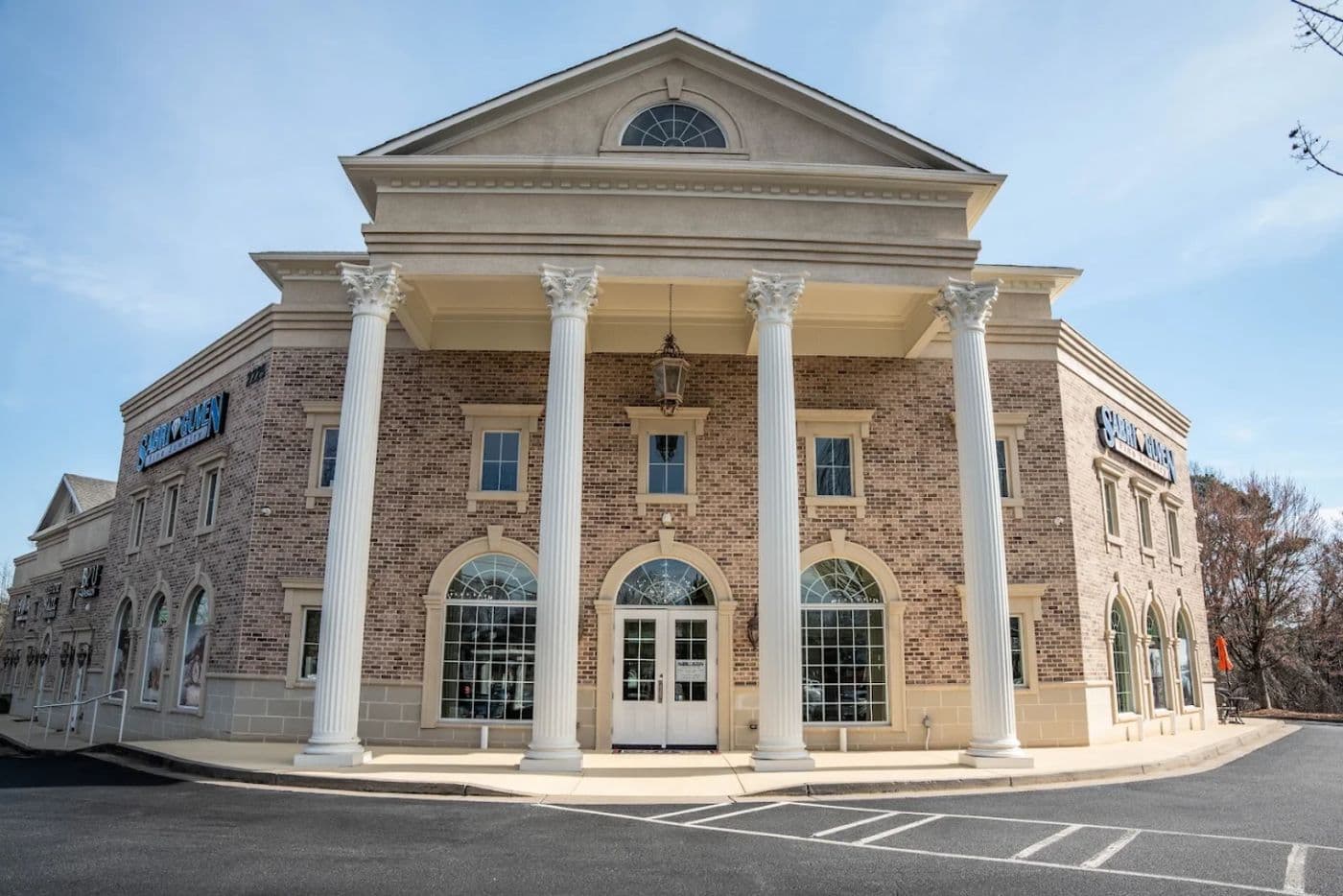 The brick and stone building on Old Milton Parkway in Alpharetta where Zach Does Watches keeps its bench